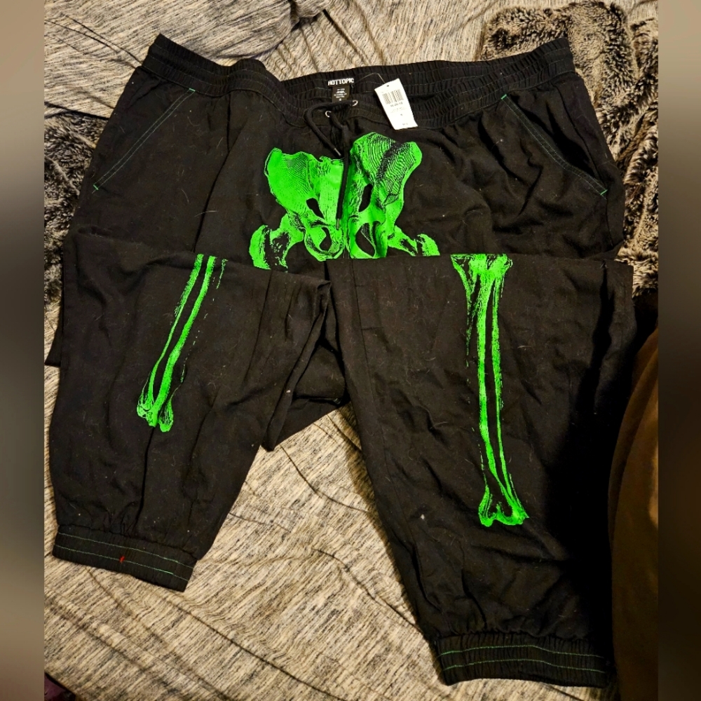 Hot topic size 5 Jean like material joggers with skeleton design.